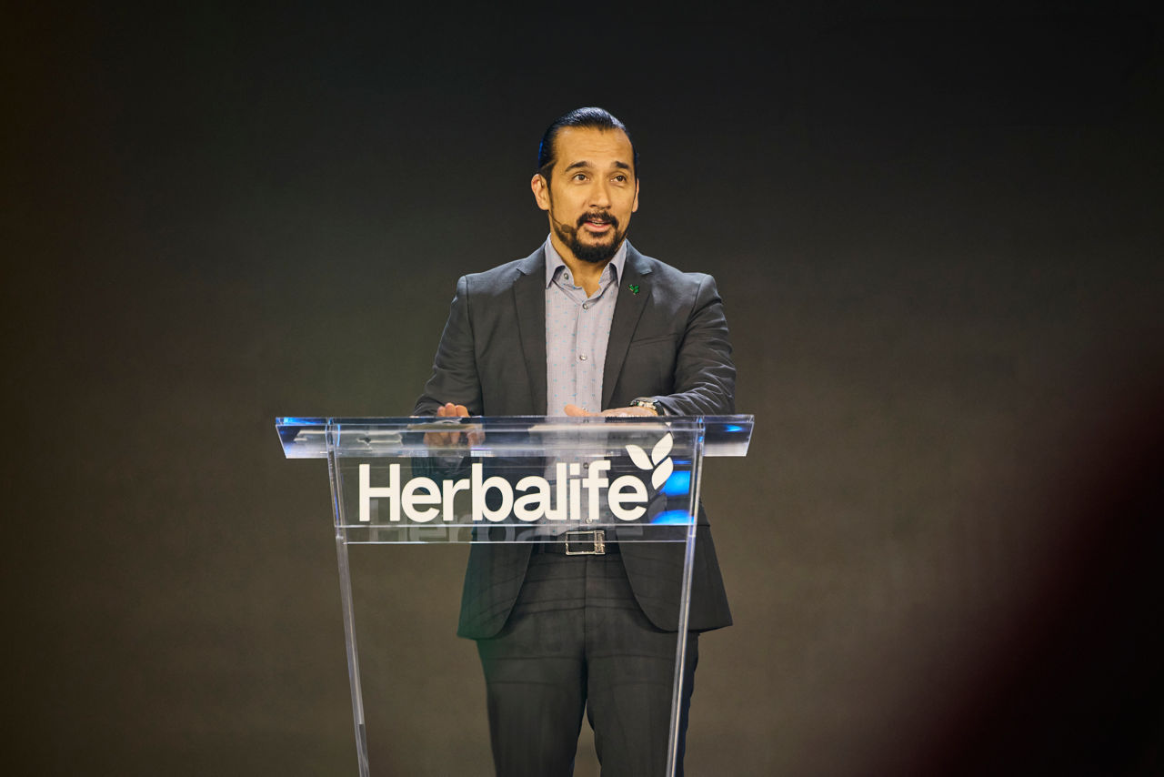 New Herbalife CEO Stephan Gratziani speaking at the opening keynote address at Honors 2025 in Los Angeles