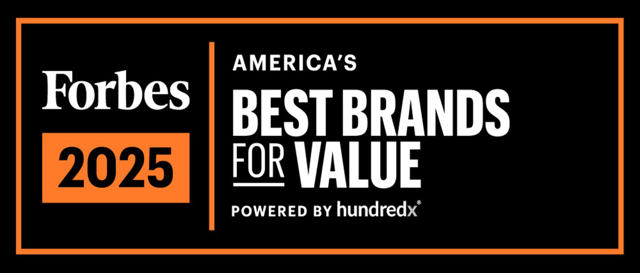 ​​​​Heather Jackson, elite endurance athlete and Herbalife-sponsored runner, stands outdoors in running gear and hydration vest, looking focused before a trail run. 